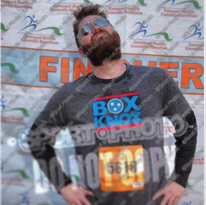 Striking a post after finishing the Covenant Health Knoxville Marathon 5k on March 29, 2015