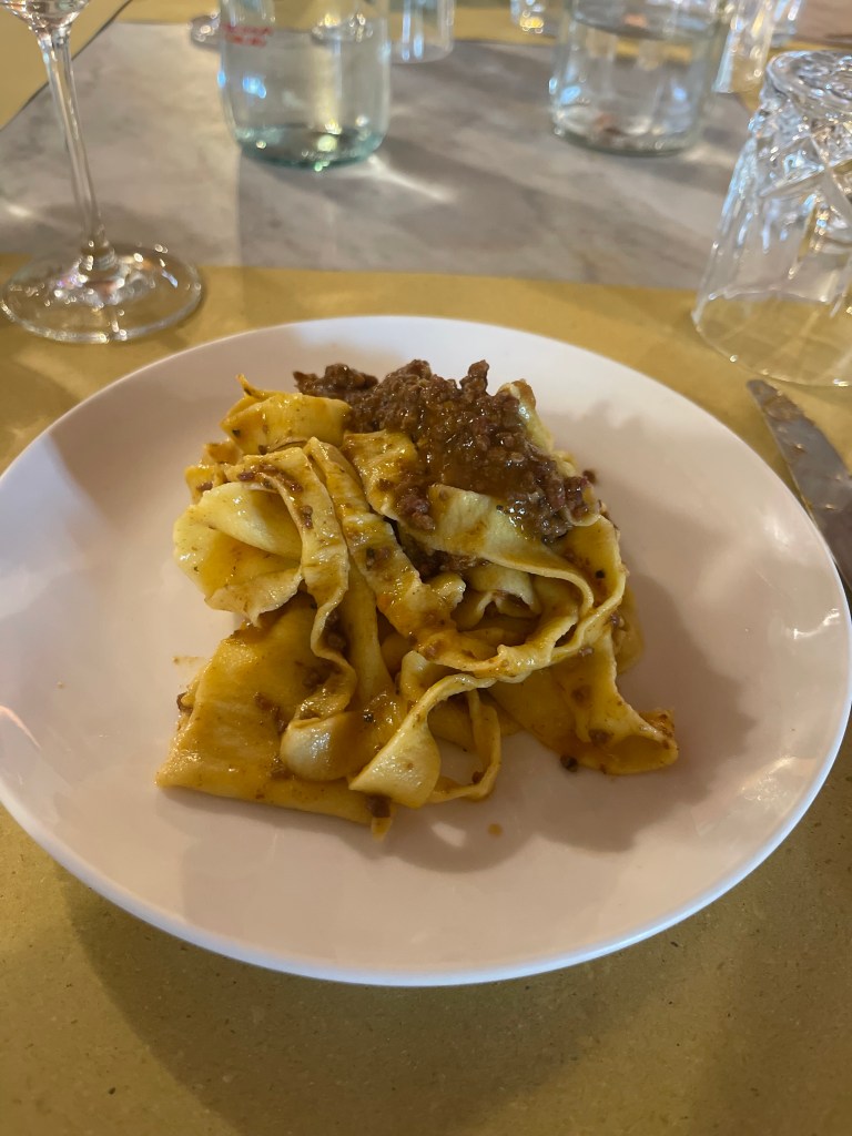 Homemade Pappardelle pasta with a boar ragu at Podera la Rocca Agriturismo in Montepulciano, Italy
