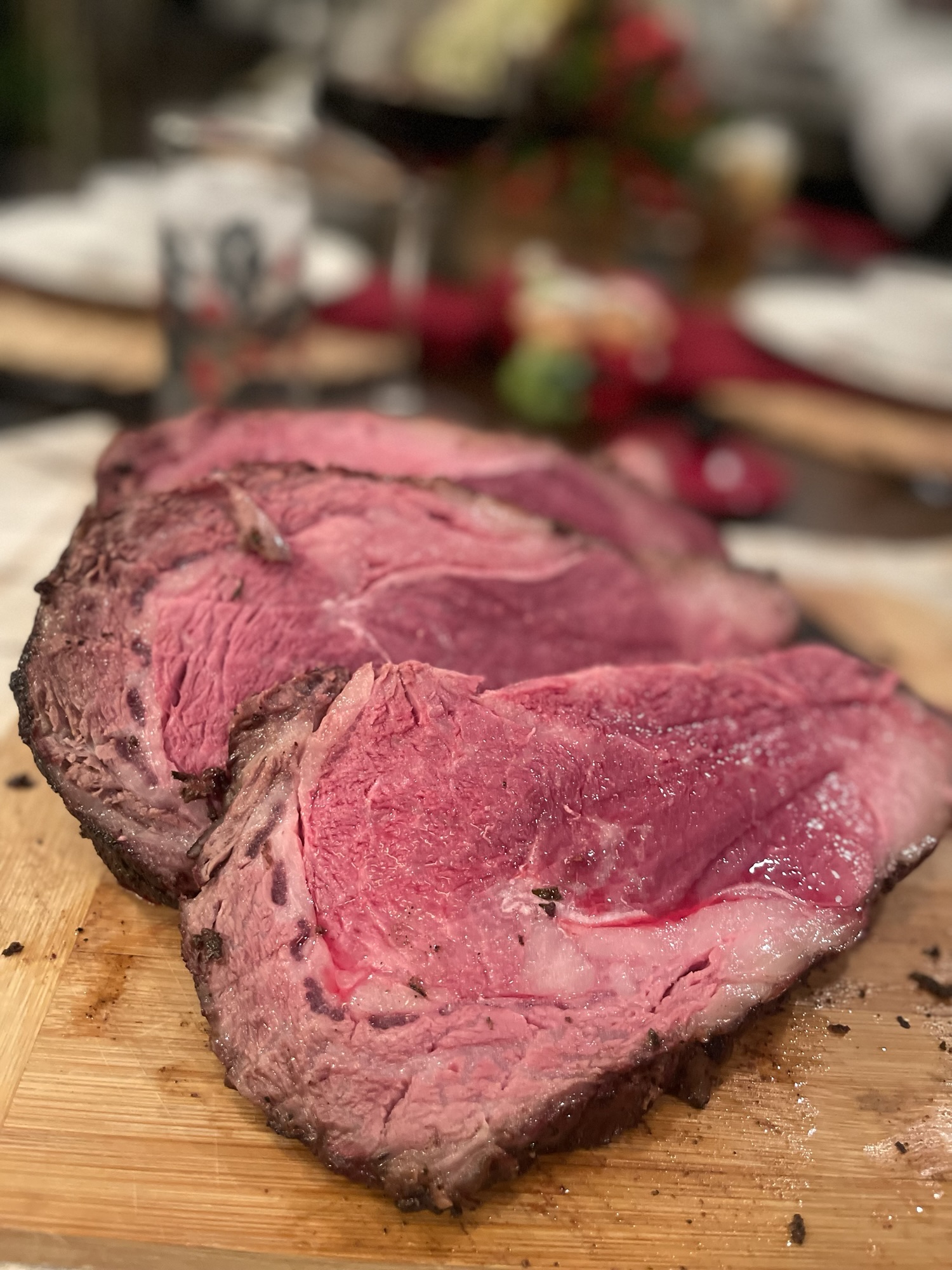 Sliced, 19oz prime ribs cooked to a cool rare. Perfection.