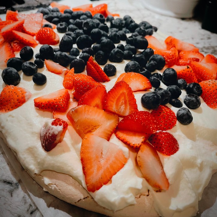 Pavlova with Strawberries and Blueberries.