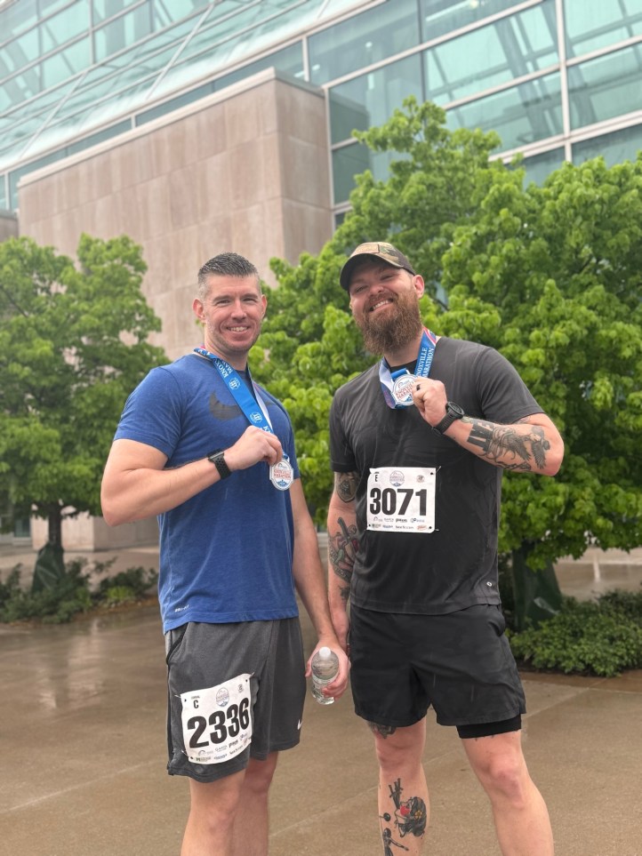 Aaron and I after finishing the half-marathon