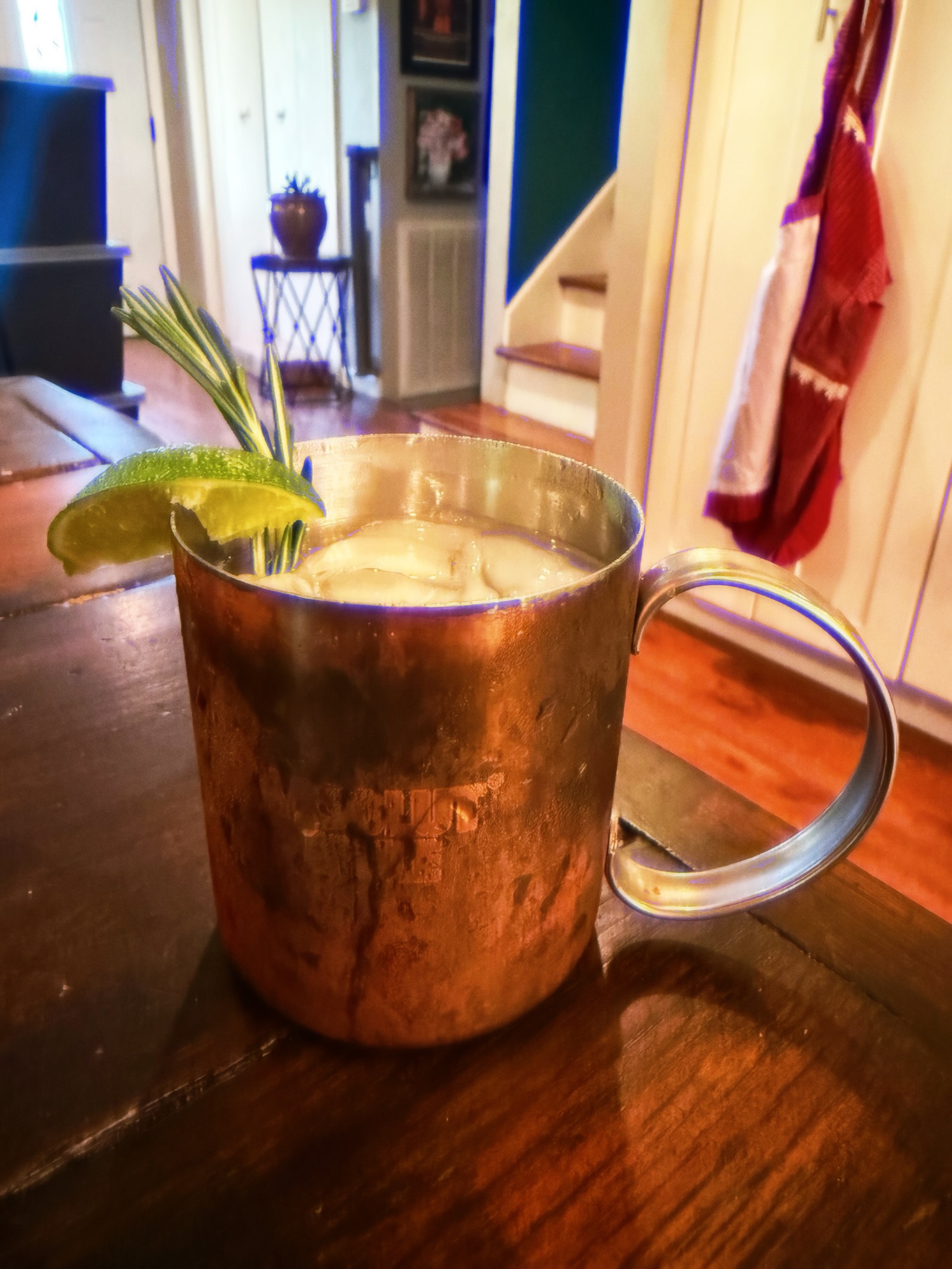 The Viking Mule Cocktail, garnished with Fresh Rosemary and Lime