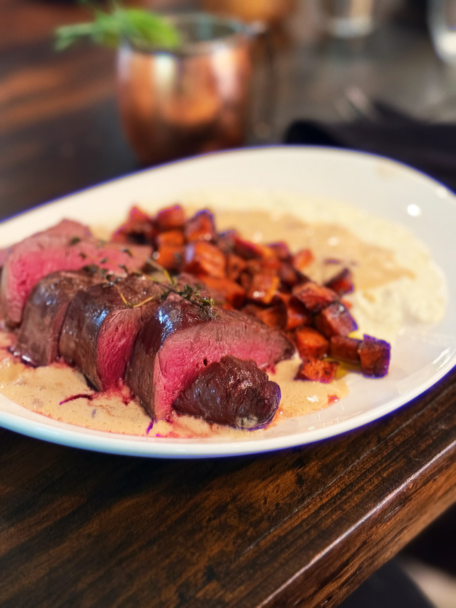 Venison tenderloin, creamed fennel, mushroom sauce and marinated sweet potatoes