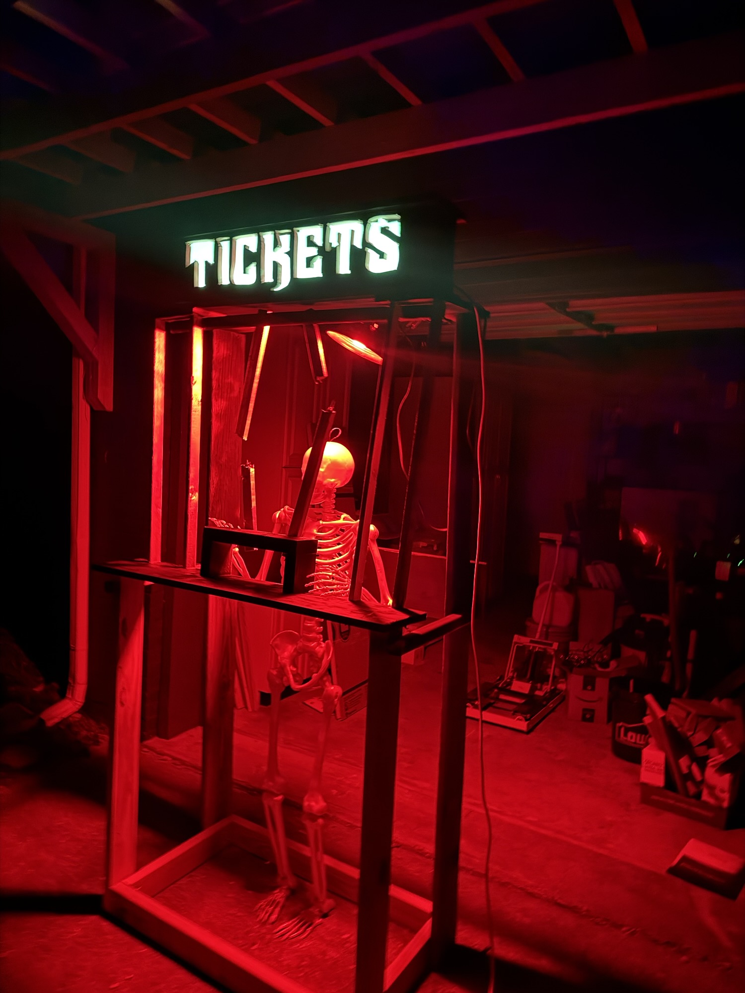 Ticket booth at night, mostly finished